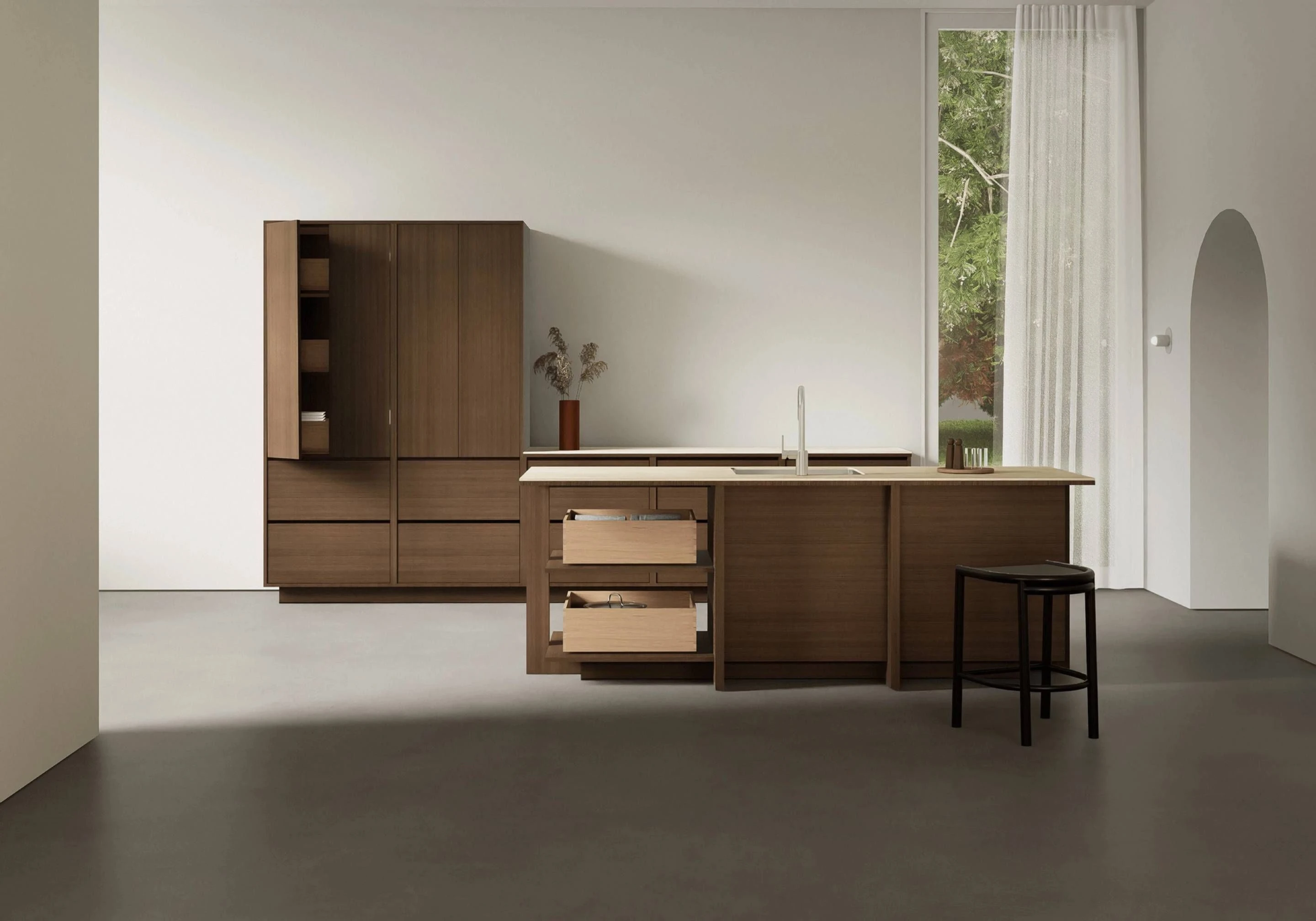 Vue d’ensemble de l’îlot de cuisine Aruki conçu par Appareil Architecture, caractérisé par des lignes épurées, une composition monolithique et une finition soignée.